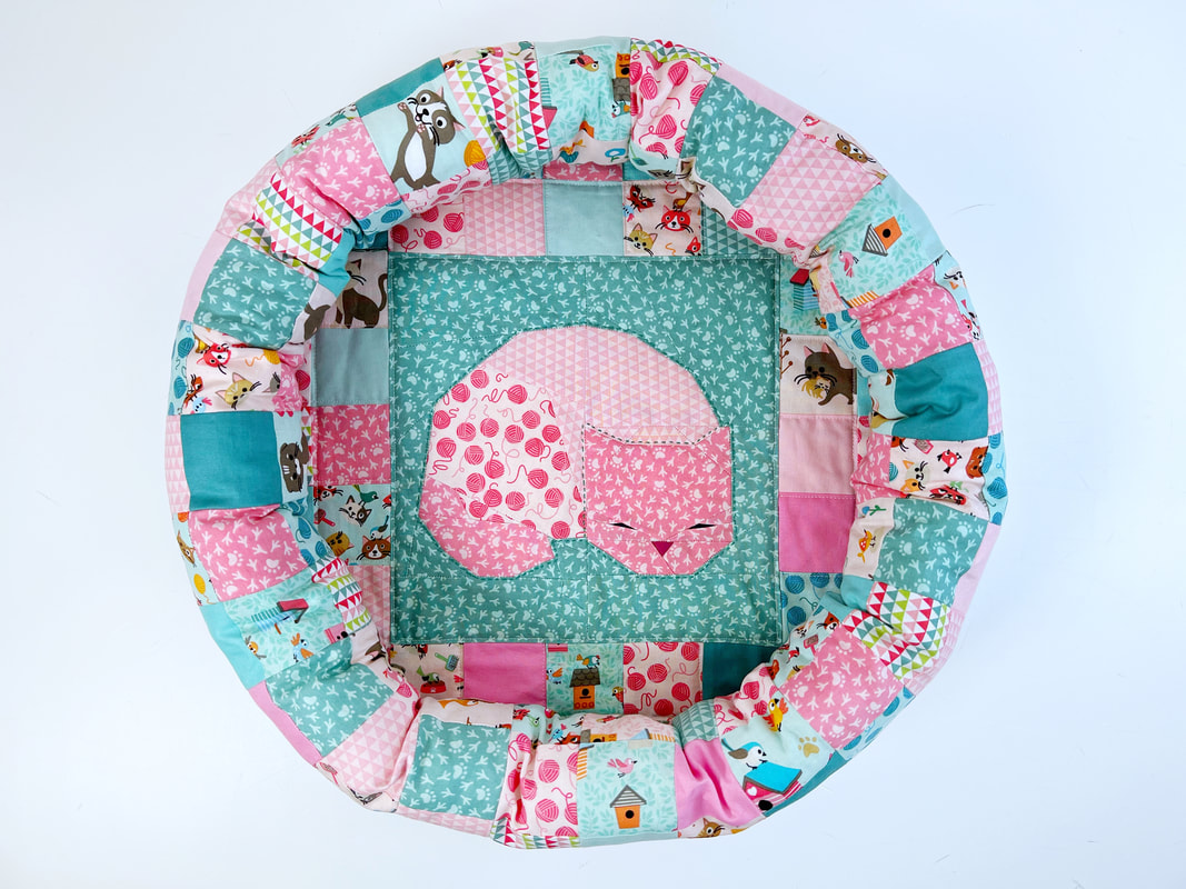 the cutest quilted cat bed
