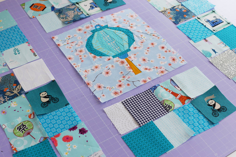 place the squares around the quilt block