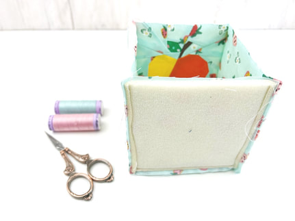 join the side edge seams of your fabric cube